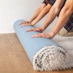 How Do I Flatten a New Rug