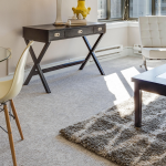 How Do You Secure an Area Rug to Carpet